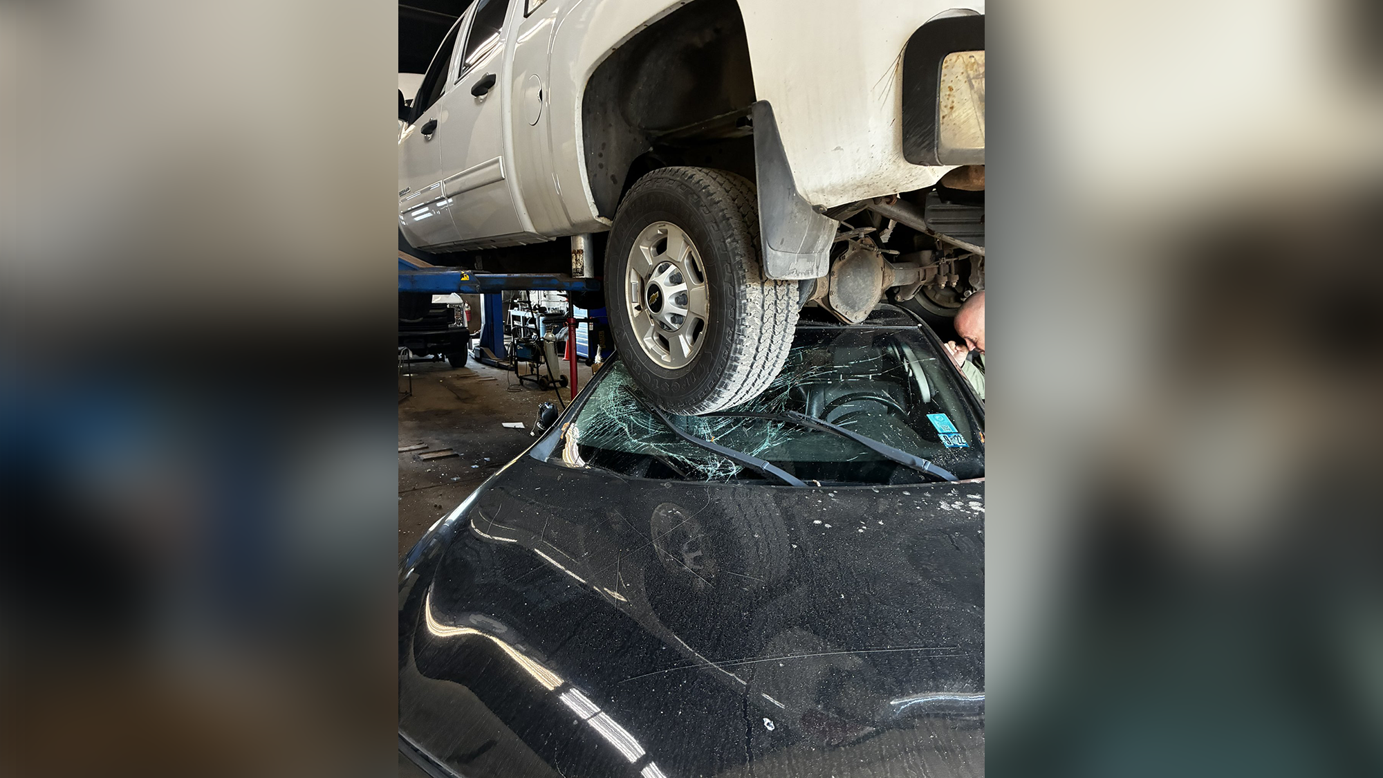 Car crashes into City of Pittsburgh garage, ends up under hoist — WTAE 4 (Pittsburgh)